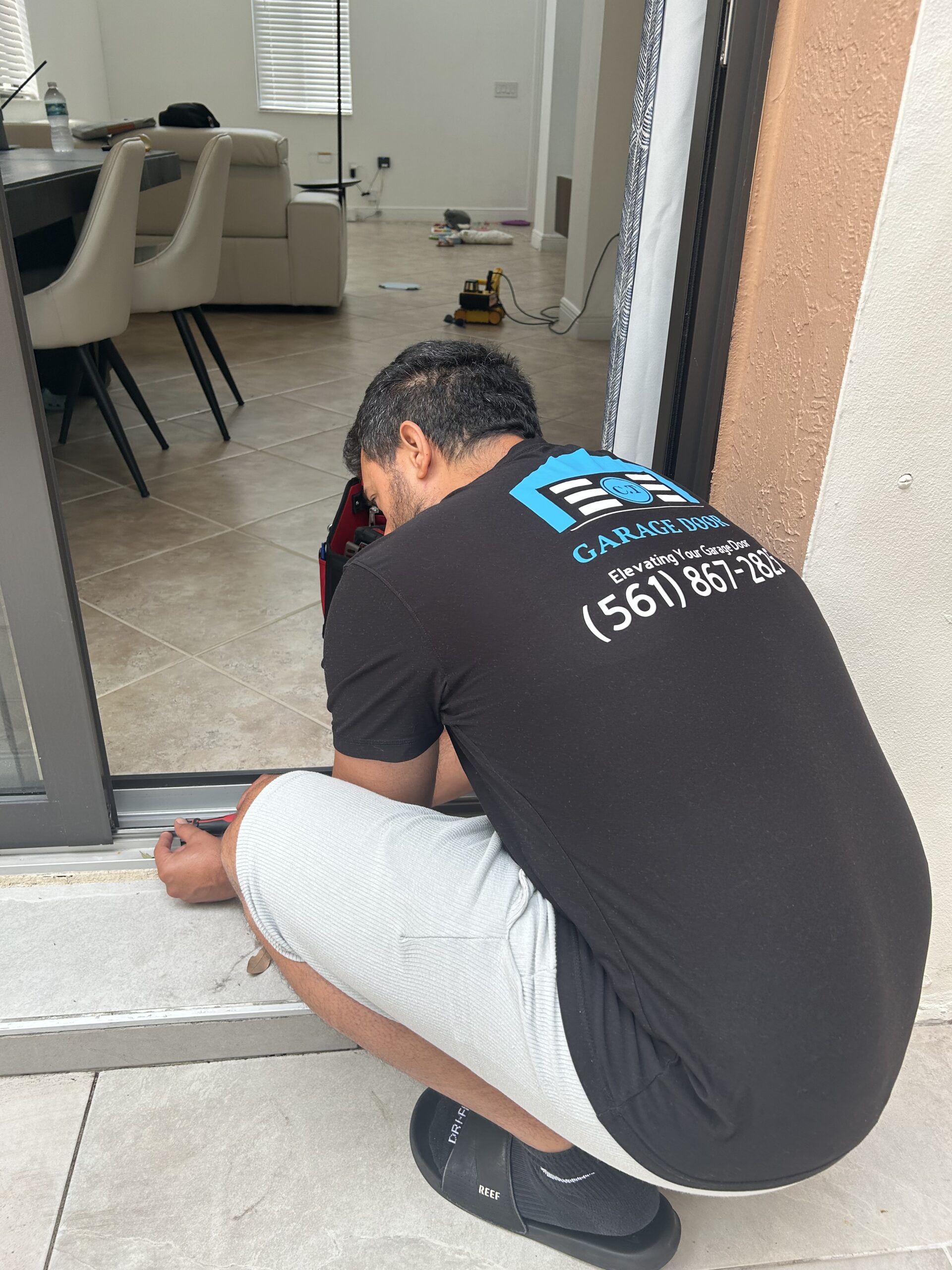 Repairing a large sliding patio door in Palm City, FL